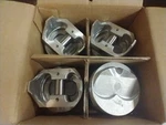 350120 Badger Cast Pistons .040 Over And Pins. Fixed Price $42.50.